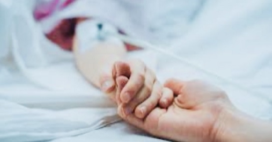 holding-a-sick-childs-hand-05-12