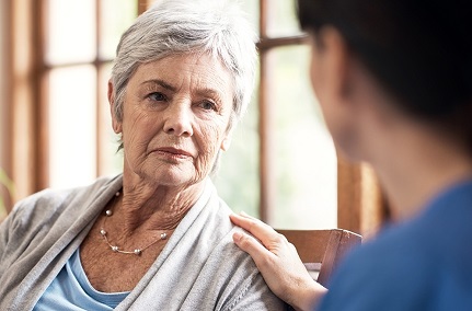 shot-of-a-young-nurse-talking-with-an-elderly-woman-in-a-retirement-home