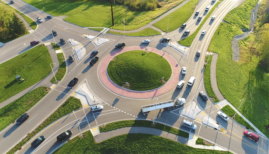 busy-city-roundabout-intersection-at-sunrise-rush-hour