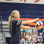 img_0505: Senior Averi Decker prepares for a serve. 