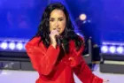 Demi Lovato performs on stage during American Heart Association Go Red for Women and Red Dress Collection Concert at Jazz at Lincoln Center in New York on Jan 31^ 2024.