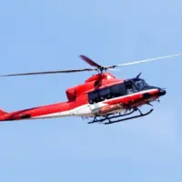 Rescue helicopter with blue sky in the background
