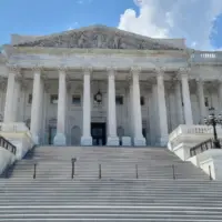 The Eastern facade with the stair to the House of Representatives of the United States Capitol Building^ on Capitol Hill in Washington DC^ USA.
