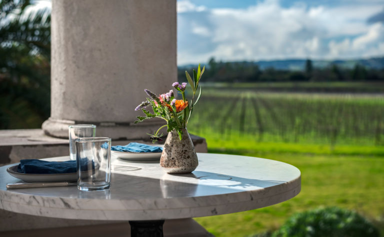 flowersandvasewithbrunchsettingsrestonmarbleround