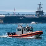 A photo of a U.S. Coast Guard cutter boat in the Tuna Harbor area. SAN DIEGO^ CA/U.S.A. - AUGUST 17^ 2019