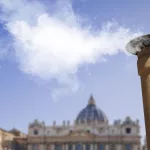 Vatican City - 04-25-2025: White smoke from the chimney on top of the Sistine Chapel. It indicates that the Pope has been elected.