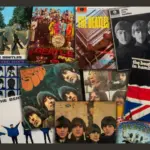 The Beatles LP vintage vinyl records cover collection from in a pile.