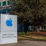 [2016-12-26] Apple Headquarters^ 1 Infinite Loop in Cupertino^ California^ USA. Apple headquarters buildings^ apple log on the sign board.