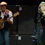 SACRAMENTO^ CA - JULY 6: John McVie (L) and Stevie Nicks of Fleetwood Mac perform in support of the bands' Extended Play release at Sleep Train Arena on July 6^ 2013 in Sacramento^ California.