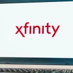 Laptop computer displaying logo of Xfinity^ the trade name of Comcast Cable Communications^ LLC to market consumer cable television^ internet^ telephone.