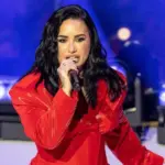 Demi Lovato performs on stage during American Heart Association Go Red for Women and Red Dress Collection Concert at Jazz at Lincoln Center in New York on Jan 31^ 2024.