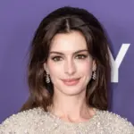 Anne Hathaway wearing dress and shoes by Valentino attends presentation of movie Armageddon Time during 60th New York Film Festival at Alice Tully Hall on October 12^ 2022