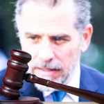 Hunter Biden ^court session. Judicial Hammer on the background of the photo.