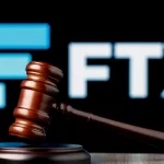 FTX is cryptocurrency exchange. Gavel on table against background of FTX logo.