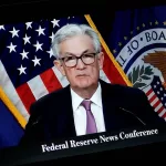 Fed Chair Jerome Powell Talking about Inflation^ Wathing the Video on CNBC Television YouTube Channel^ on a Macbook Pro