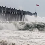 Photo taken amid sea spray and crashing waves as Hurricane Ike's outer bands impact the Florida coast^ September 2008.