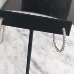 Lot# 27: Sterling silver and C2 hoop earings with locking safety catch