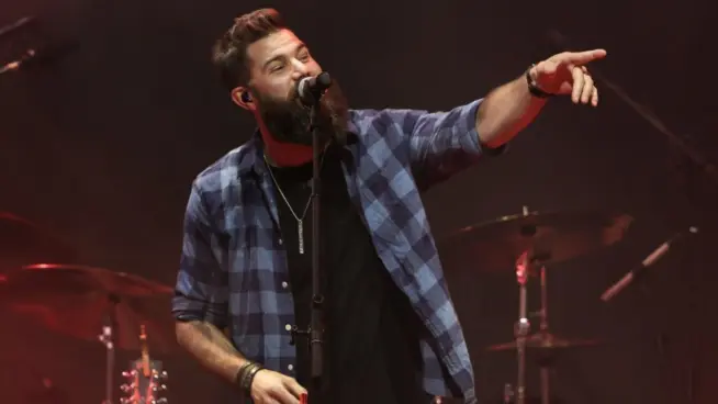 Jordan Davis performs at CMT's RAMJAM on June 3^ 2019 at TopGolf in Nashville^ Tennessee. NASHVILLE^ TN - JUN 3: