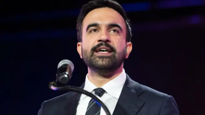 Mayoral candidate Zohran Mamdani speaks during 'New York is not for sale' rally at Forest Hill Stadium in New York on October 26^ 2025.