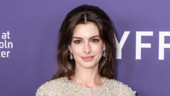 Anne Hathaway wearing dress and shoes by Valentino attends presentation of movie Armageddon Time during 60th New York Film Festival at Alice Tully Hall on October 12^ 2022