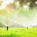 automatic-lawn-sprinkler-watering-green-grass-sprinkler-with-au