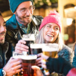 friends-drinking-beer-at-brewery-bar-outdoor-on-winter-time-fr