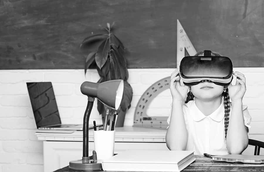 virtual-education-child-cute-pupil-wear-hmd-vr-glasses-studyin