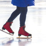 girl-ice-skating-on-an-ice-rink-hobbies-and-leisure-winter-spo
