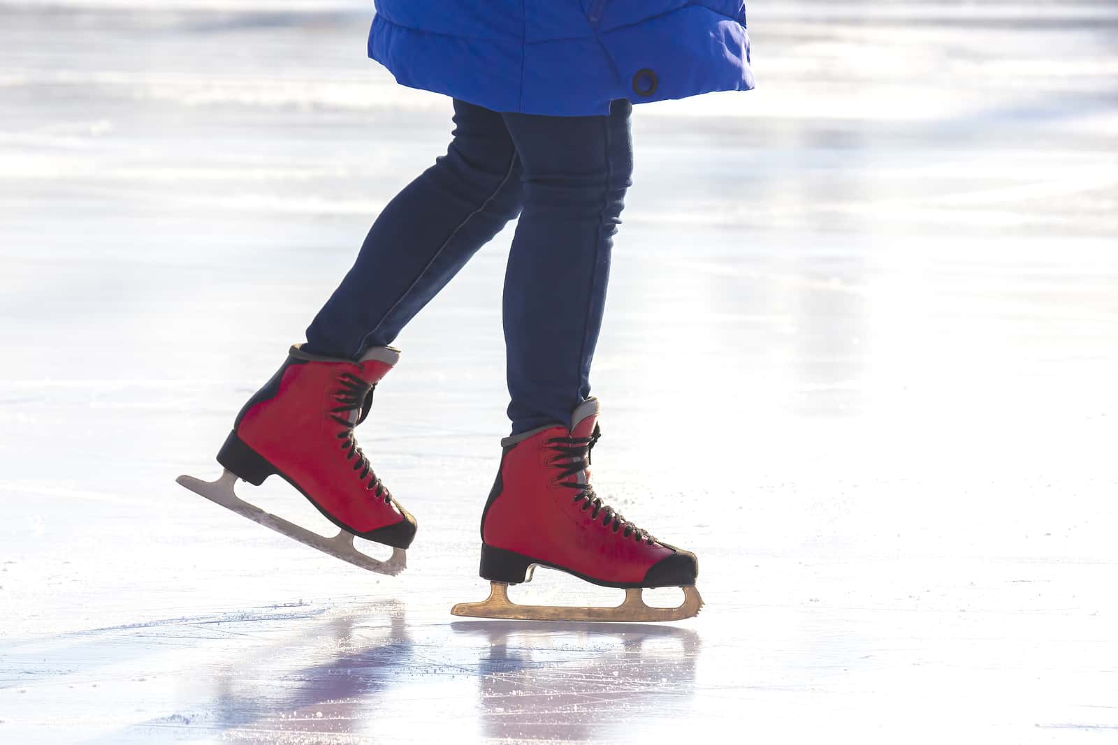 girl-ice-skating-on-an-ice-rink-hobbies-and-leisure-winter-spo