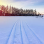 snowmobile-track-in-snowlandscape-winter-time-background