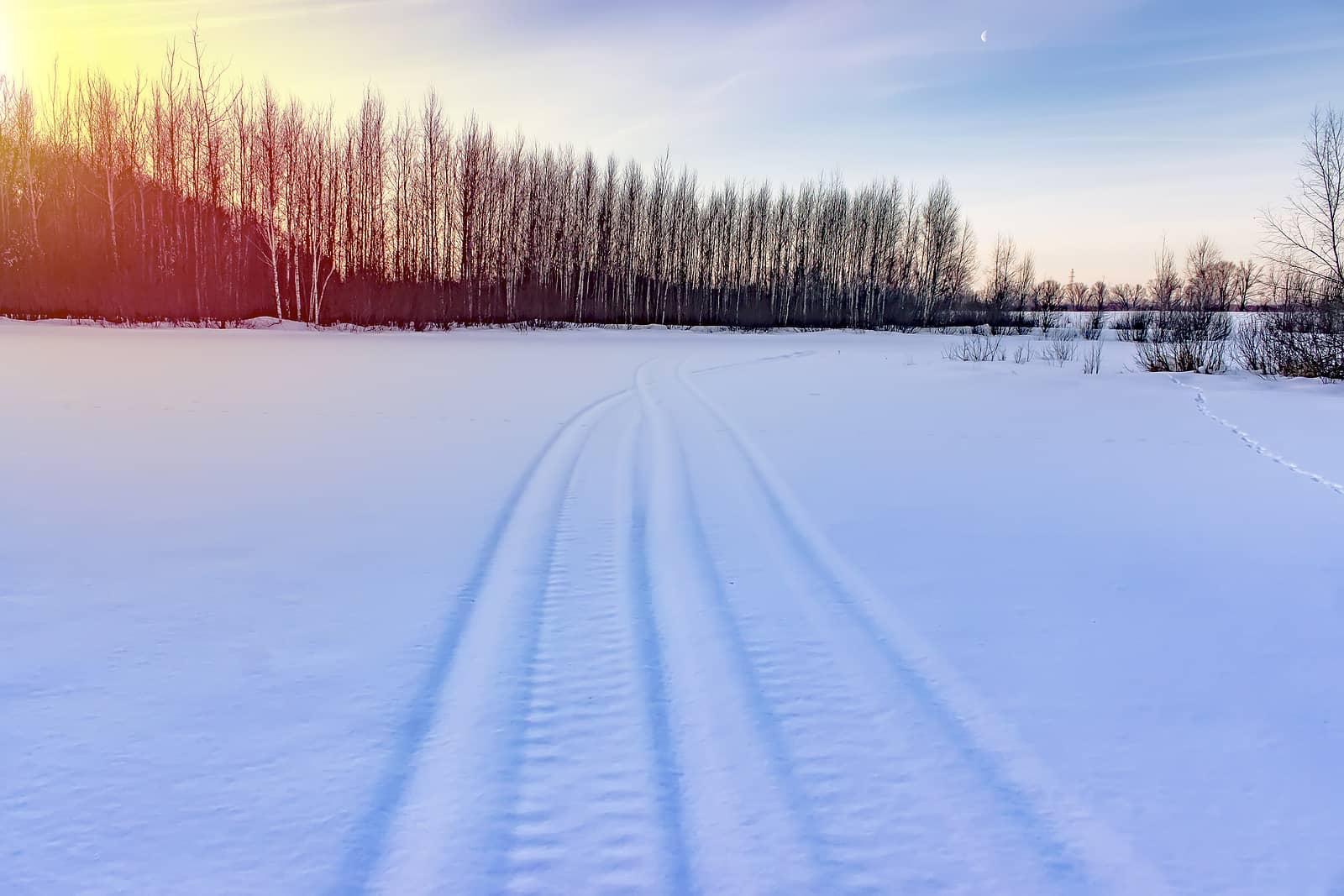snowmobile-track-in-snowlandscape-winter-time-background