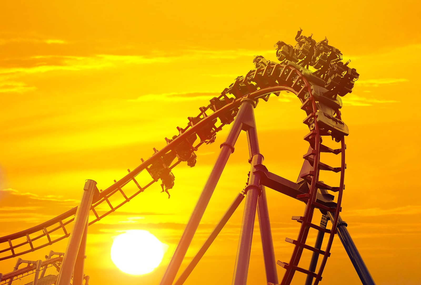 roller-coaster-in-the-amusement-park-with-the-sunset-background