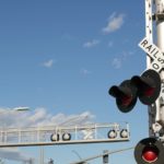level-crossing-warning-signal-in-usa-crossbuck-notice-and-red-t