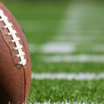 pro-american-football-on-the-field-close-up-with-room-for-copy
