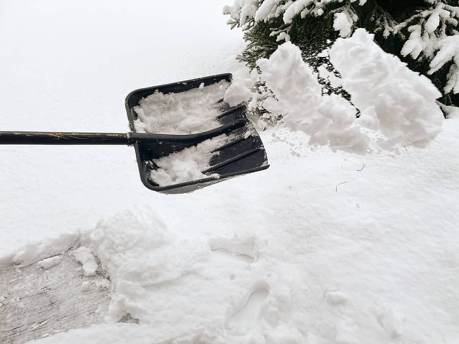 somebody-is-throwing-snow-with-a-plastic-shovel-snow-removal-to
