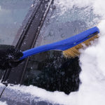 cleaning-the-car-from-snow-in-winter-snow-covered-car-after-a-s