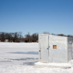 ice-shanty-on-a-frozen-lake