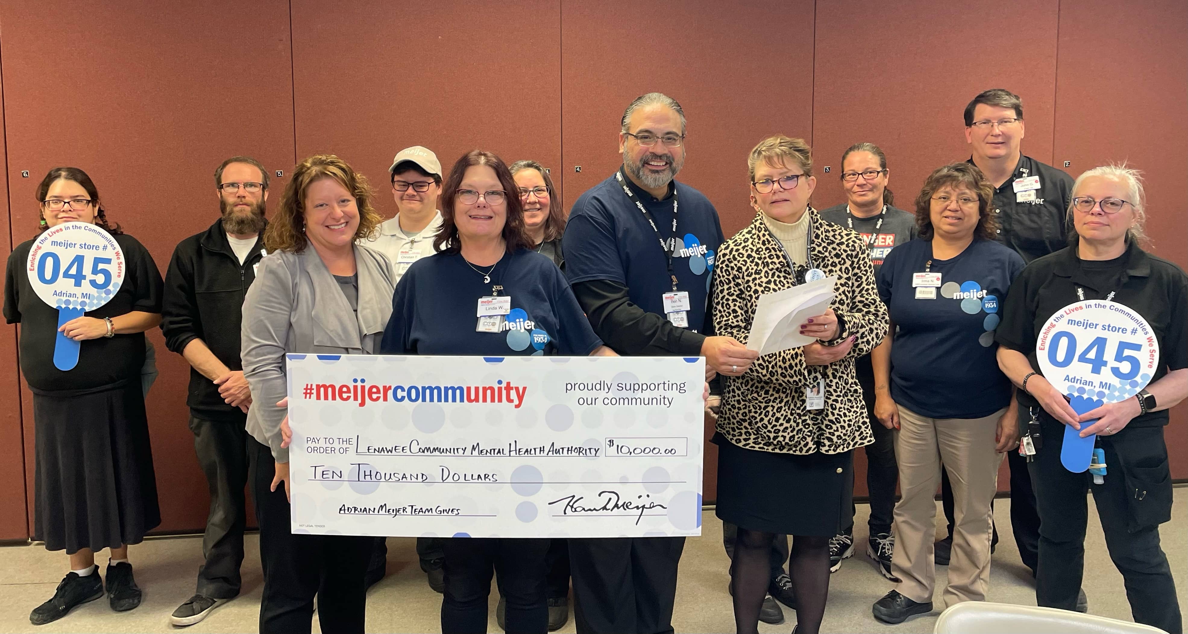 adrian-meijer-team-members-deliver-10k-check-to-lenawee-community