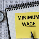 minimum-wage-words-in-a-white-notebook-on-the-background-of-a