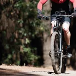 mountain-biking-man-riding-on-bike-in-summer-mountains-forest-la