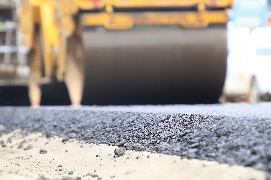 road-construction-asphalt-road-by-worker-and-roller-machine-asp