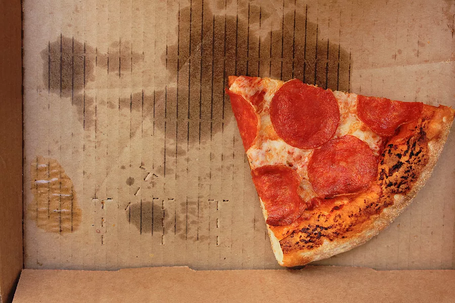 leftover-pepperoni-pizza-slice-in-delivery-box-last-food-piece
