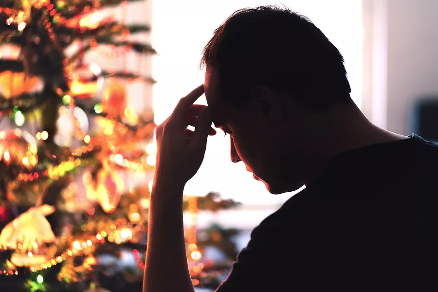 sad-on-christmas-unhappy-lonely-or-tired-man-with-with-stress