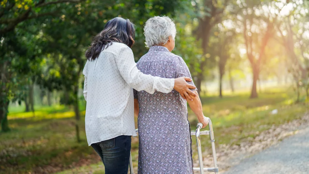 help-and-care-asian-senior-or-elderly-old-lady-woman-use-walker
