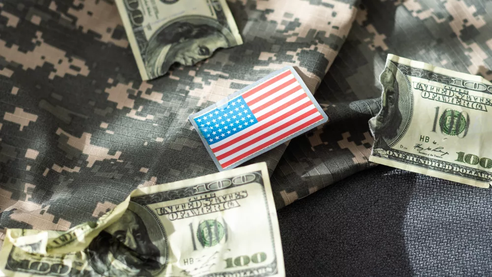 usa-flag-and-money-cash-for-va-loan-from-u-s-department-of-veterans-affairs