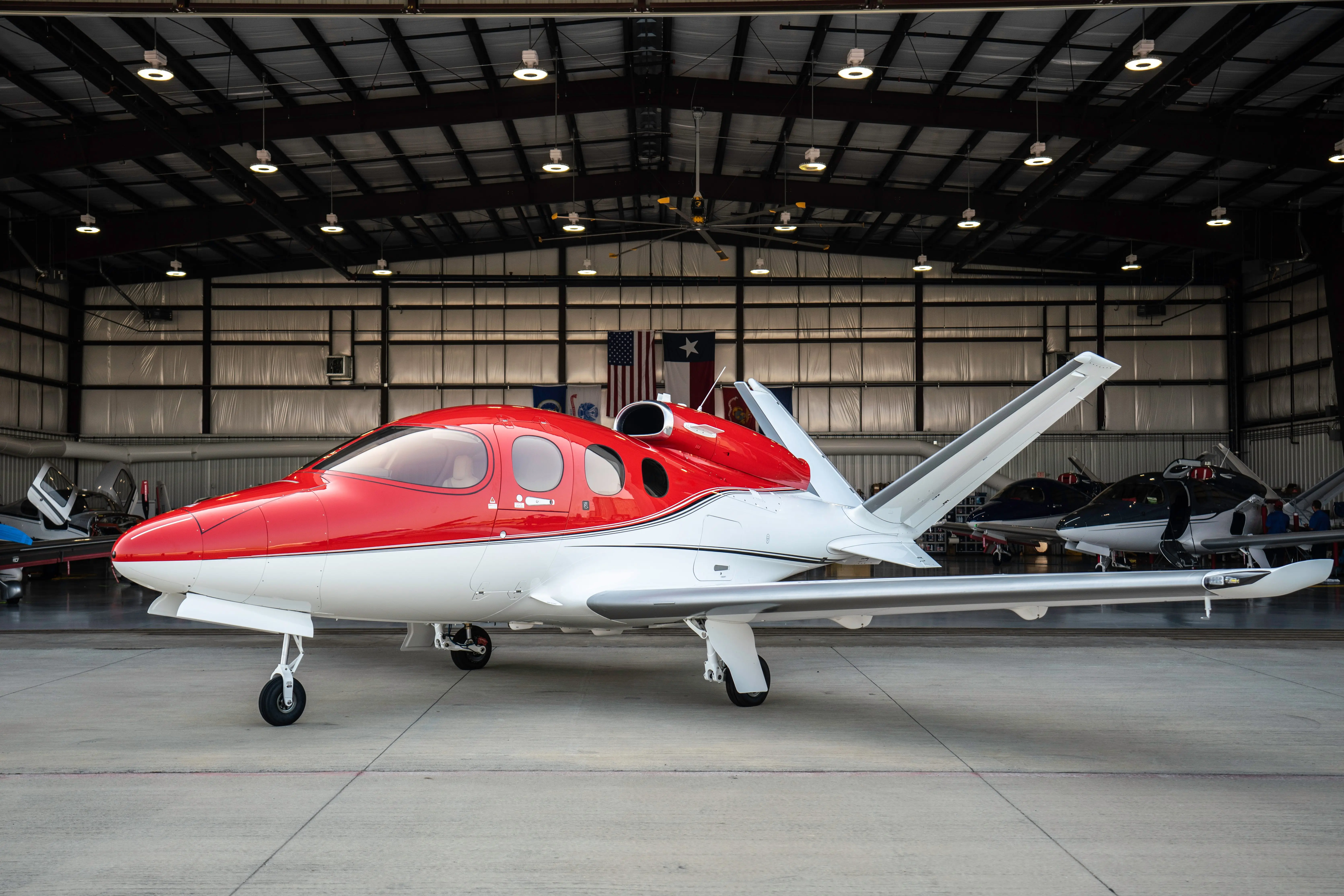 private-airplane-on-ground-in-front-of-hanger