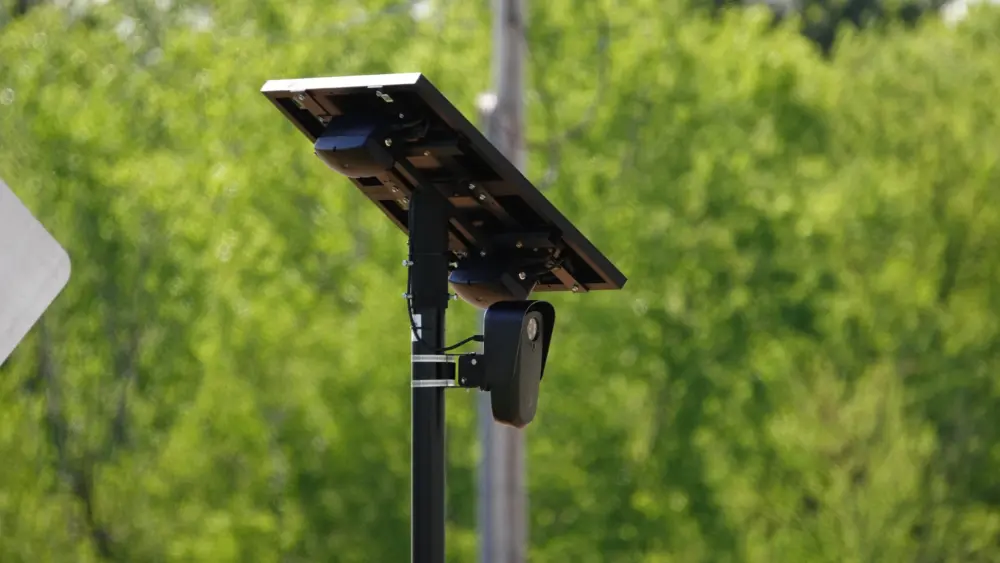flock-safety-police-law-enforcement-license-plate-reader-set-up-outside-to-help-catch-vehicle-speeders