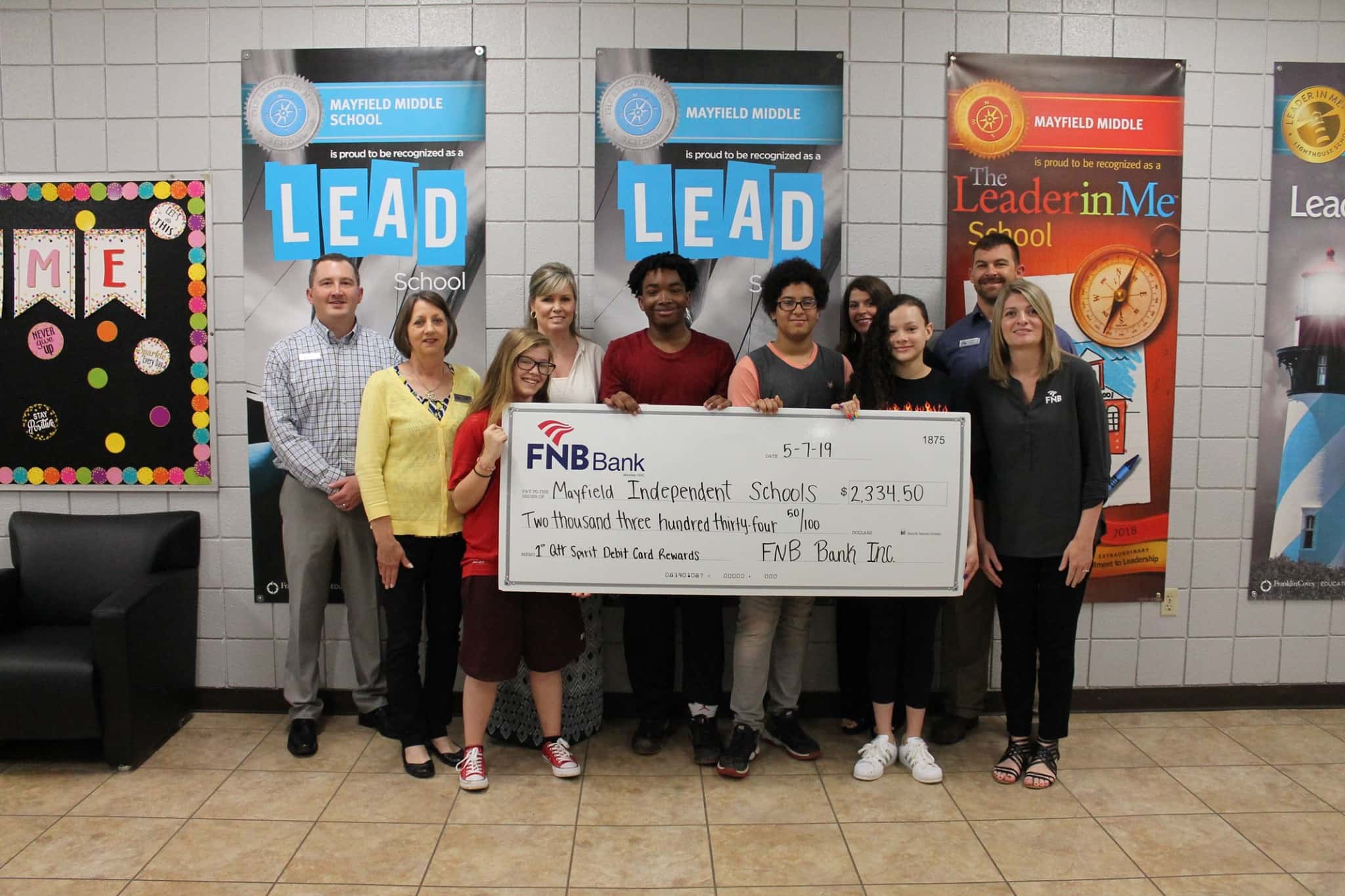 FNB Bank Presents 1st Quarter Spirit Debit Program Checks WKDZ Radio