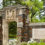 Entrance Sign of Duke University on campus of Duke University in Durham^ North Carolina^ Duke is a private top ranked research university in NC. Durham^ NC^ USA - April 16^ 2022