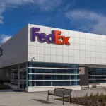 FedEx logo on the building of FedEx Ship Centre in Toronto. TORONTO^ CANADA - NOVEMBER 19^ 2017